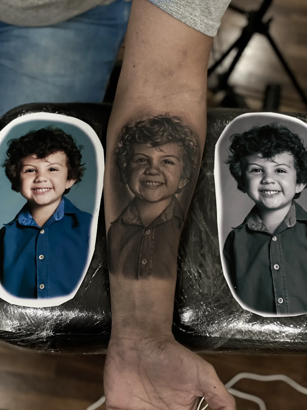 Child portrait tattoo with reference photo by Ramon Rodrigo