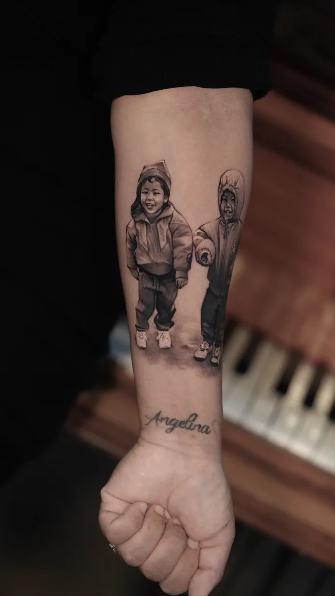 Children portrait memorial tattoo by Ramon Rodrigo