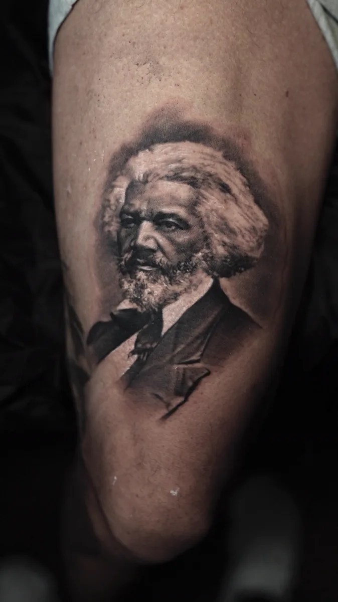 Frederick Douglass portrait tattoo by Ramon Rodrigo